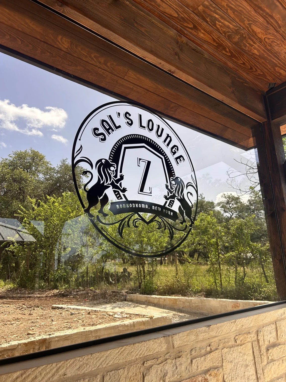 Sal's Lounge custom window graphic